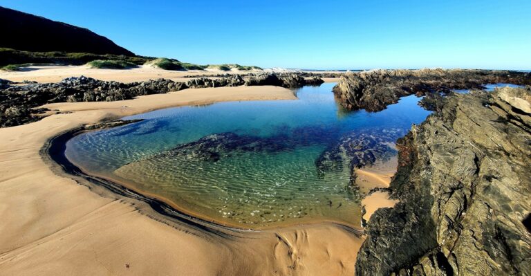 Relax at the stunning Sardinia Bay Beach in Port Elizabeth when visiting