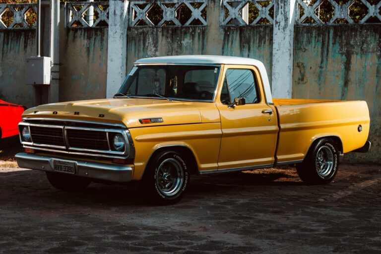A yellow single cab bakkie